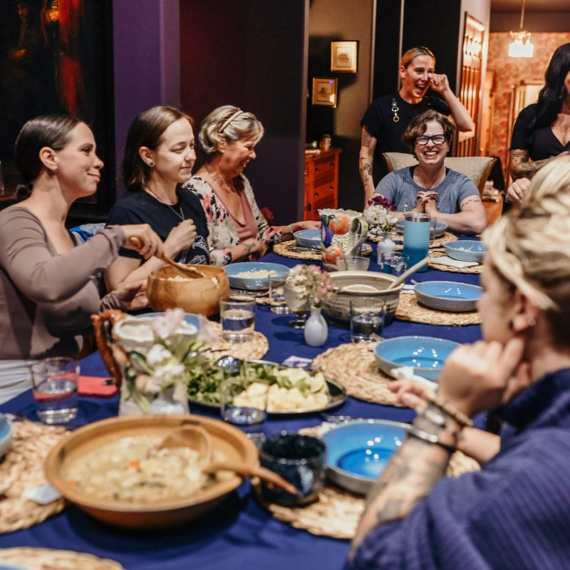 Yoga Retreat - Group Eating Dinner